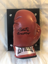 Roberto Duran autographed signed Everlast Red/Blk boxing gloves.